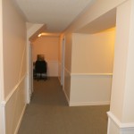 meadowfield basement hallway and den
